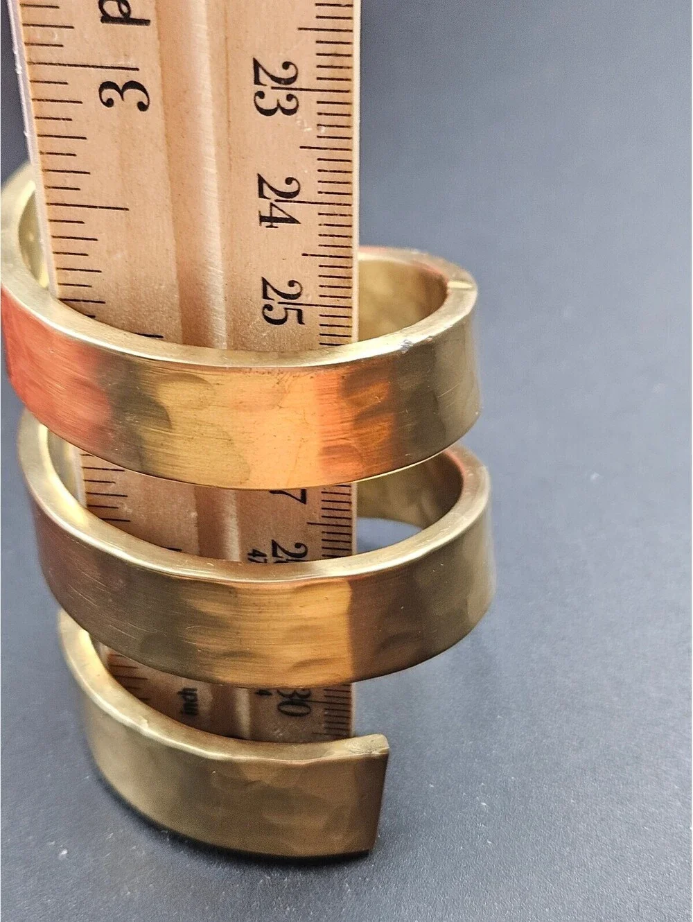 Set of 4 Spiral Hammered Brass Napkin Rings and 4 Red Napkins